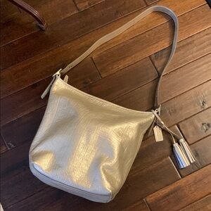 COACH Metallic Gold Shoulder Bag with hobo style shoulder strap, silver hang tag